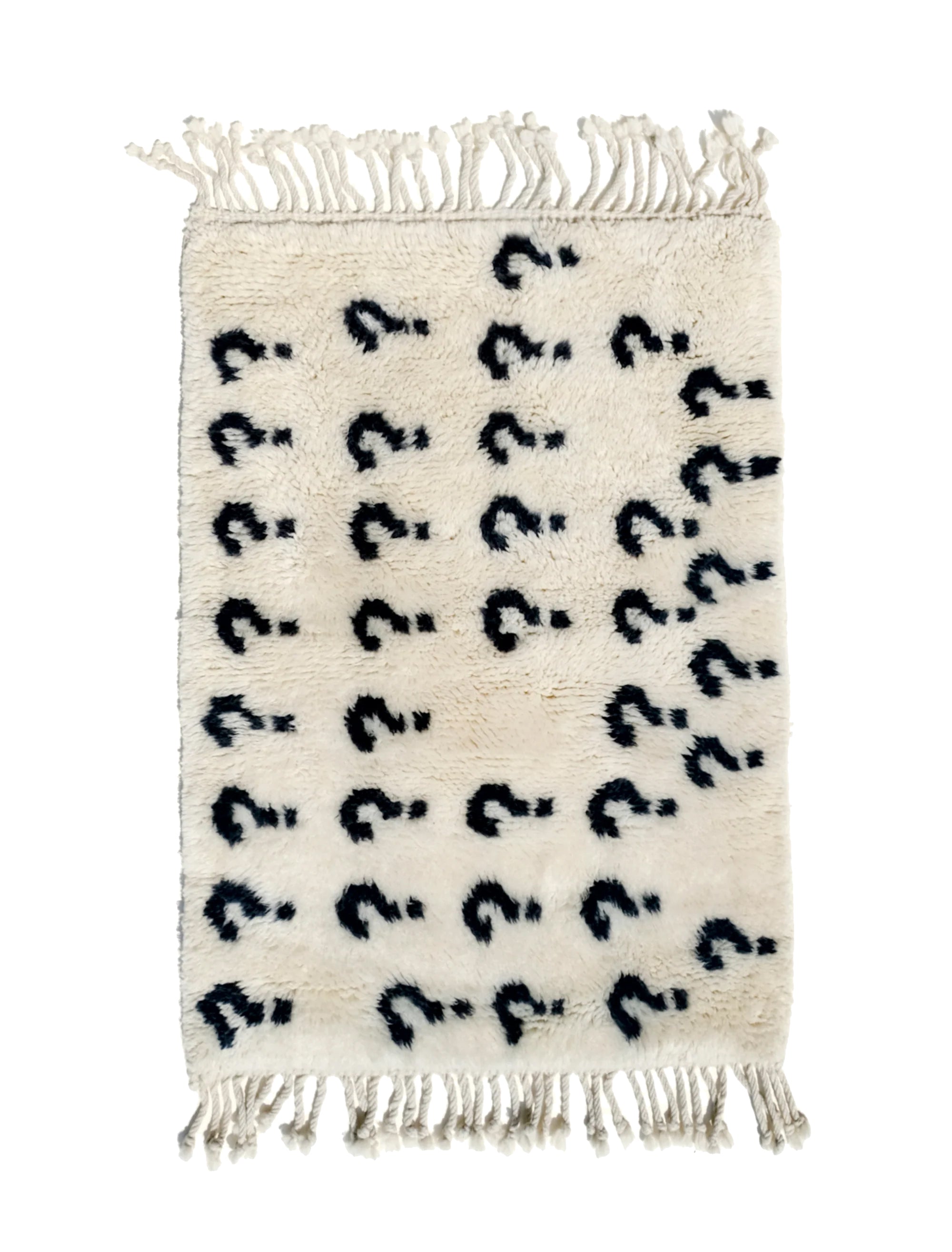 Experience the ultimate comfort with our 'Ivory Enigma Rug: Super Soft Playful Question Marks in Black Yarn.' Crafted for coziness, this rug showcases a delightful pattern of playful question marks in black yarn on an ivory background. Its irresistibly fuzzy texture adds a touch of luxury to any space, making it a perfect addition to your home. Elevate your décor with this charming blend of softness and whimsy.