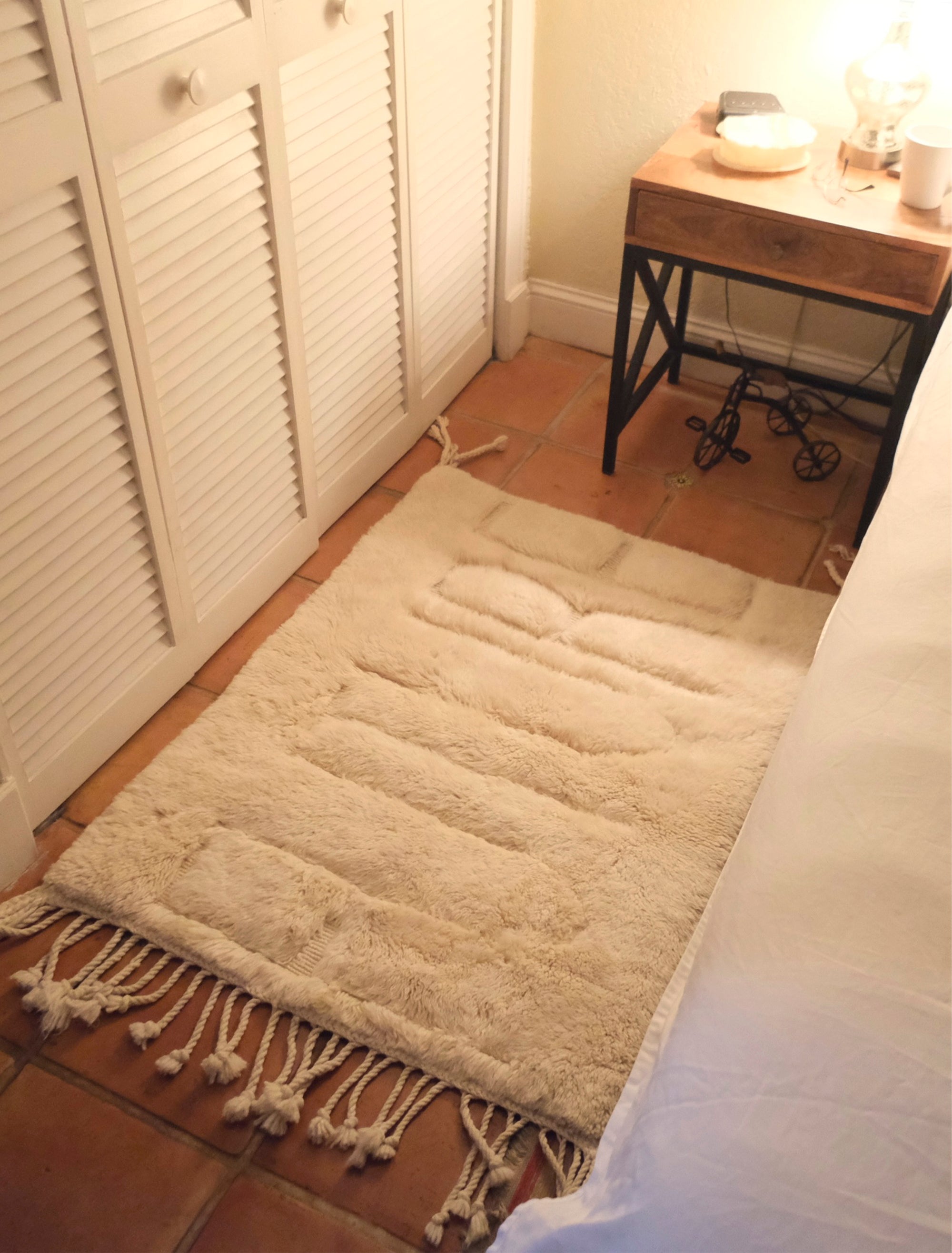 Elevate your space with our exquisite Ivory Enigma Future Rug. Crafted with classic elegance, this rug features a hidden 'Future' message subtly debossed into the luxurious fur. Discover a fusion of timeless style and contemporary intrigue, perfect for adding a touch of mystery to your décor