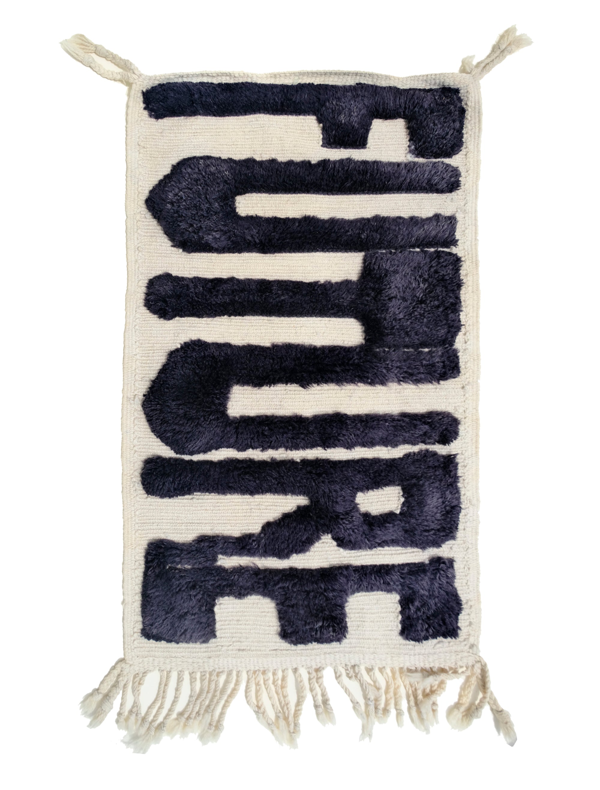 Elevate your space with the captivating "Ivory Noir Elegance Rug." Featuring embossed 'Future' letters in bold black yarn, this rug boasts a textured charm that adds a modern twist to classic black and white aesthetics. The result is a statement piece that seamlessly blends elegance and contemporary flair, making it an ideal addition to your home décor.