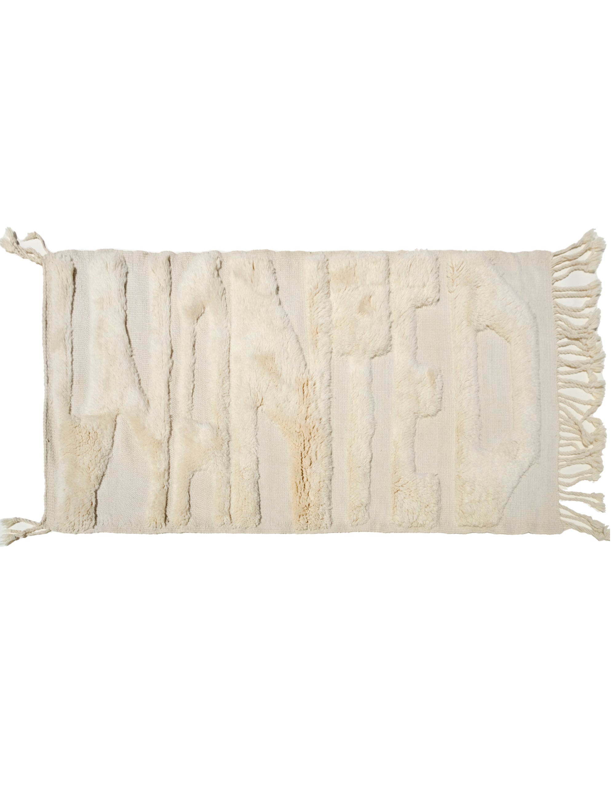 "Ivory Whispers Wanted Rug" is the epitome of sophistication and positivity. Handcrafted from luxurious ivory yarn, this rug features the subtle yet impactful message of 'WANTED' in soft, fuzzy lettering. The flat weaving base provides a cozy and timeless feel, making it a perfect addition to any space. Bring a touch of elegance and a dash of inspiration to your home with this classic ivory rug that delivers a positive message.