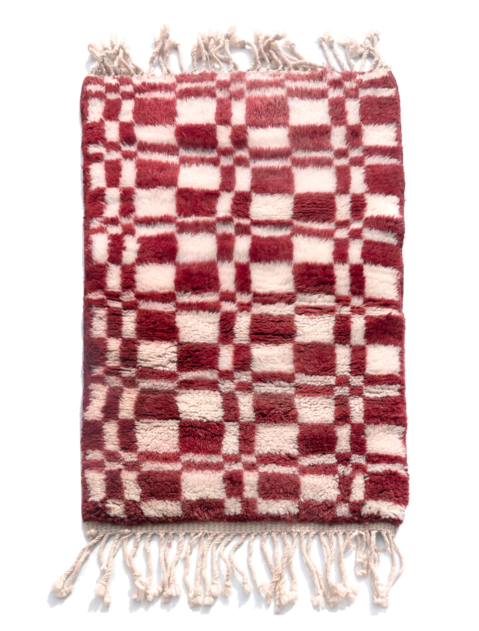 Introducing our 'Crimson Touch Chess Rug,' a beautifully crafted piece featuring a classic navy and ivory checkerboard pattern with a captivating crimson twist. Elevate your space with this rug that seamlessly blends sophistication with playfulness, adding a touch of timeless elegance and vibrant charm to your home décor.