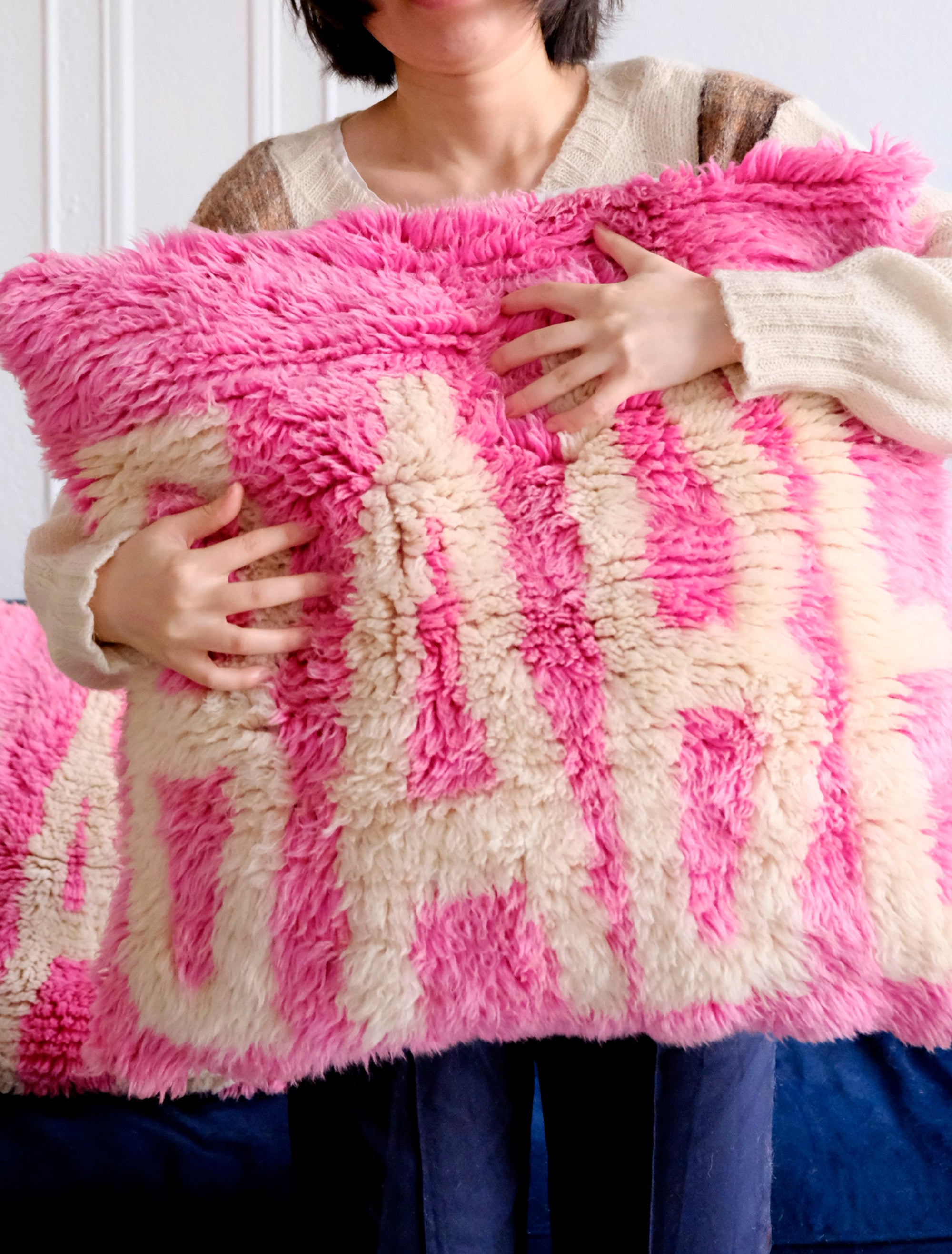 Meet our latest cushion made from a Beni Mrirt rug. Vibrant neon pink, adorned with the word "BABE" in white yarn, this 55x55cm delight effortlessly infuses joy into any space. It's not just decor; it's a celebration of style and comfort. Watch your room bloom with the playful charm of "Babe in Bloom," a vivid testament to the power of color and design.