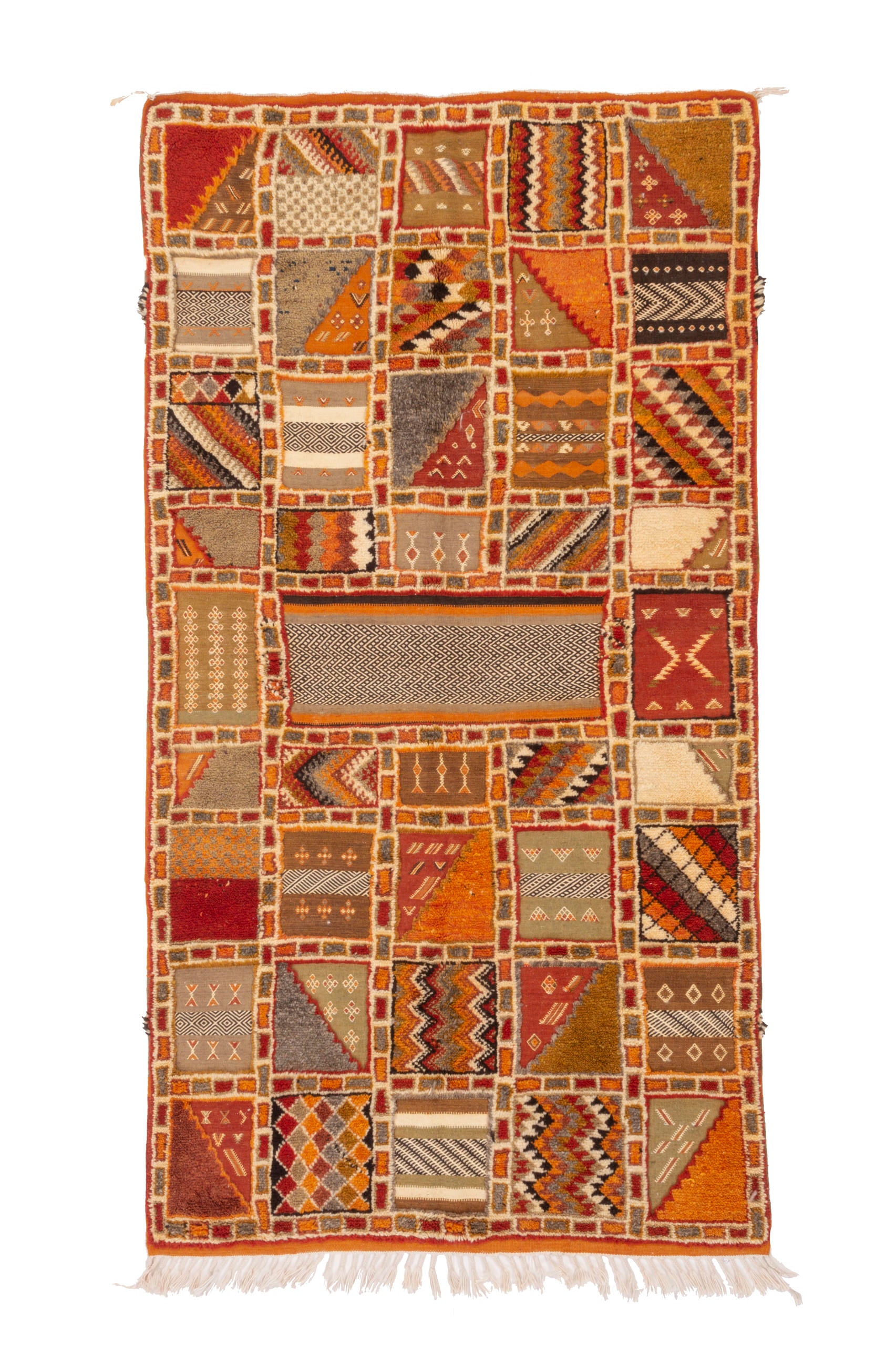 Ignite your space with our Sienna Spark Glawi Rug. This classic Glawi-style masterpiece boasts a warm yellowish-orange tone and a captivating geometric square pattern. Elevate your decor with the timeless beauty and craftsmanship of this unique rug, bringing a touch of tradition and artistry to your home.