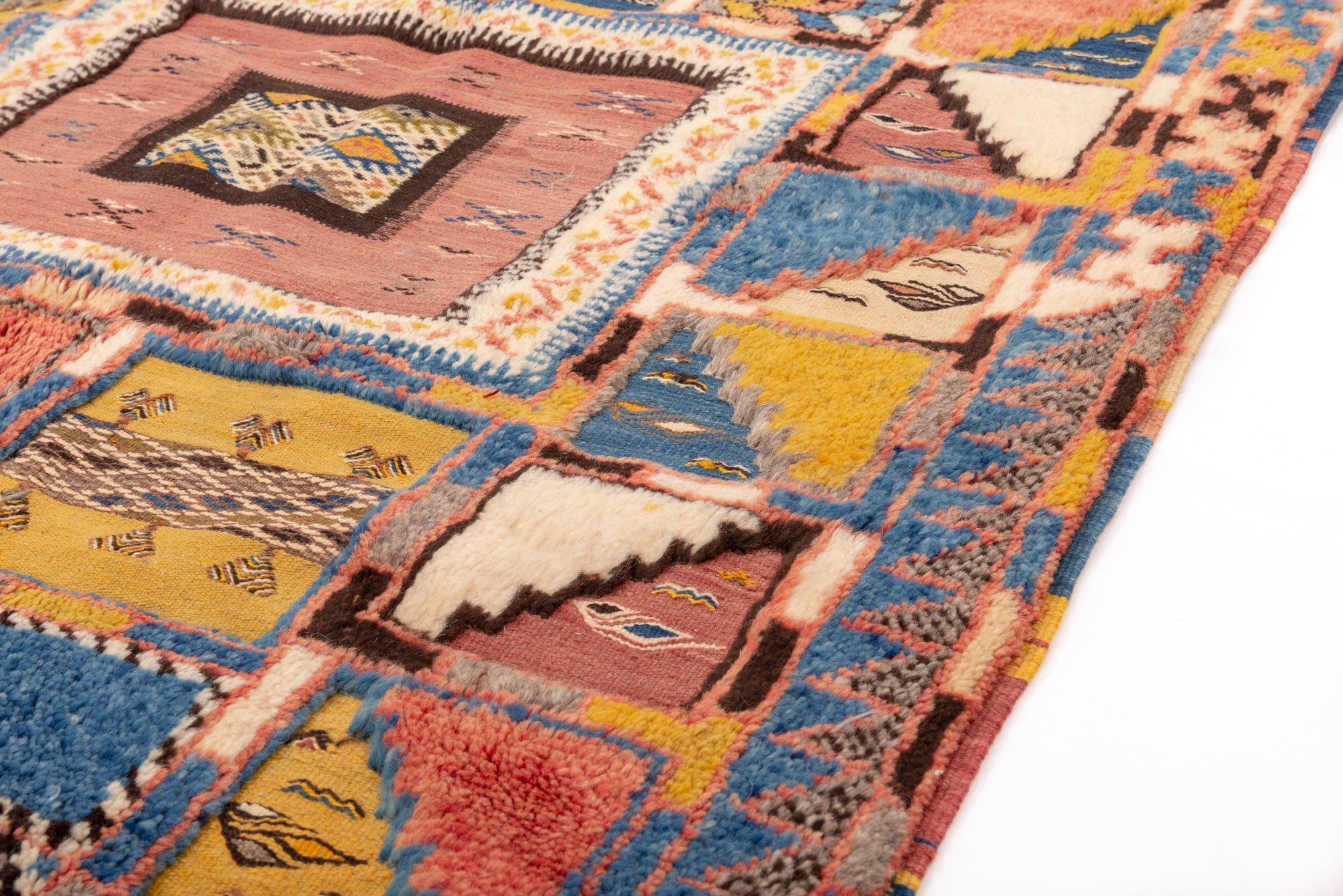 Indulge in the timeless allure of our Sunset Serenity Glawi Rug. With a classic geometric glawi pattern adorned in a mix of vintage blue, pink, and yellow tones, this rug exudes charm and character. Elevate your space with the artistry of traditional craftsmanship and the soothing hues of a bygone era.