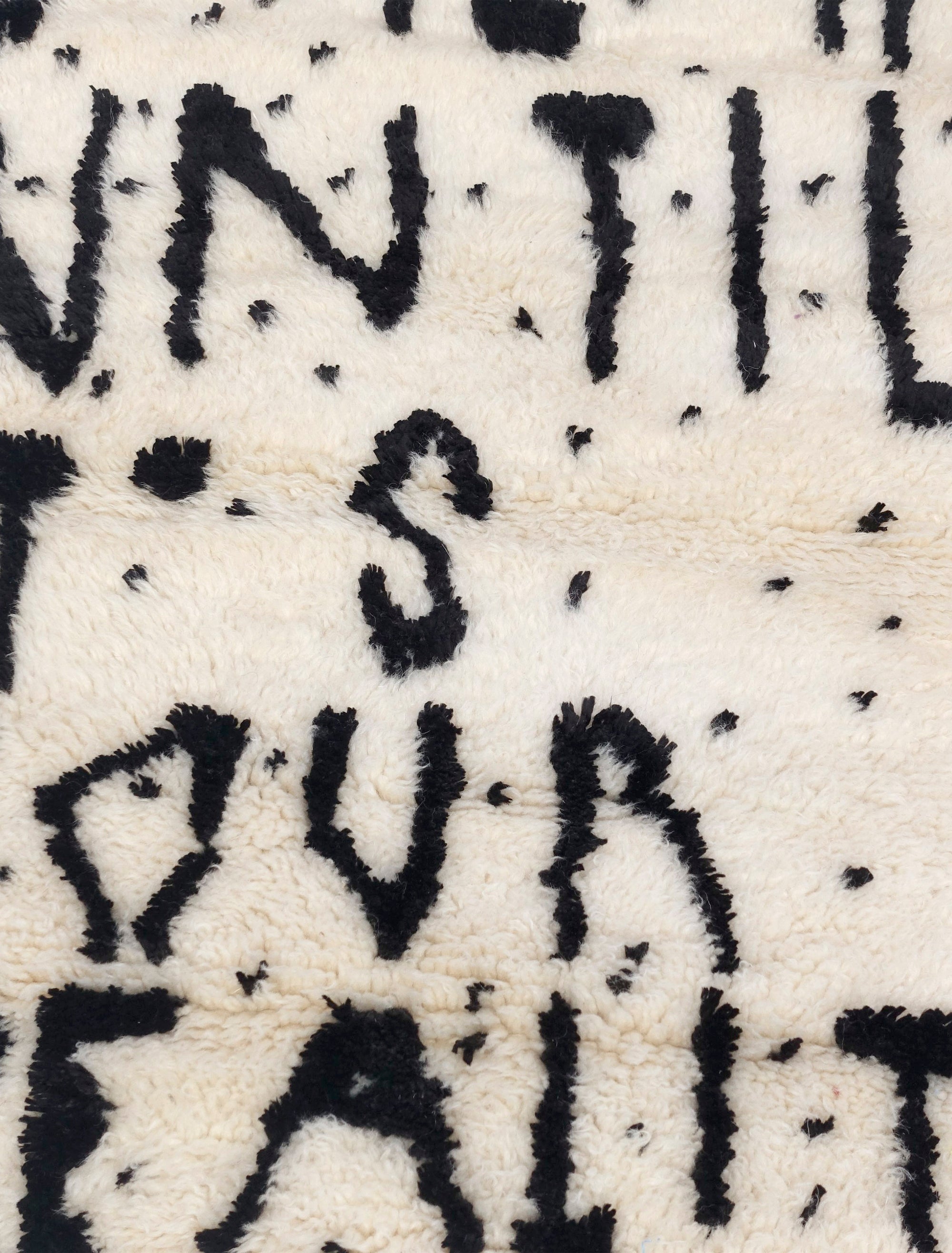 Experience the captivating allure of our Ivory Dreamscape Berber Rug, where the timeless charm of classic English script weaves a mantra of inspiration: "Dream Until It Is Your Reality." Immerse your space in this exquisite blend of classic design and motivational sentiment, transforming your home with an air of elegance and aspiration.