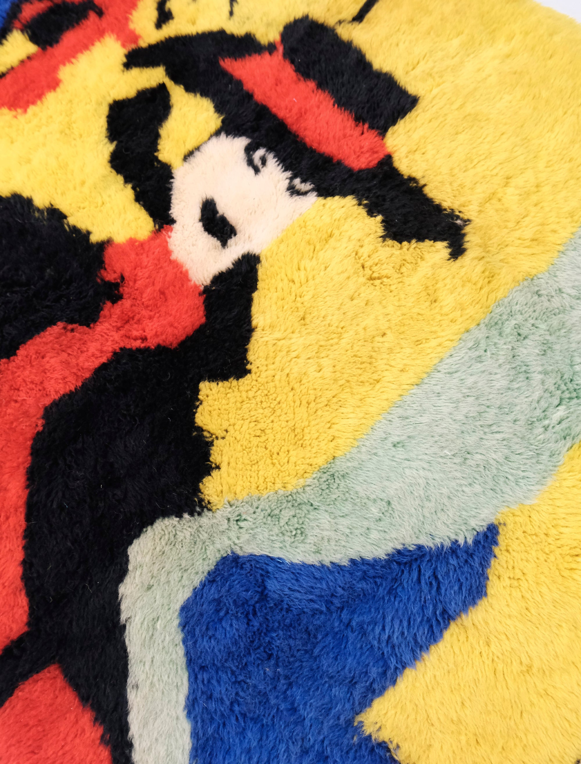 Elevate your space with our 'Vogue Revival Art Rug,' a vibrant homage to Irving Penn's iconic black and white Vogue cover. Infused with hues of red, yellow, green, and a touch of blue reminiscent of 80s web aesthetics, this rug captures both fashion history and artistic innovation. Channeling the energy of Penn's work, this multicolored masterpiece adds a dynamic touch to your decor, blending vintage charm with contemporary flair."
