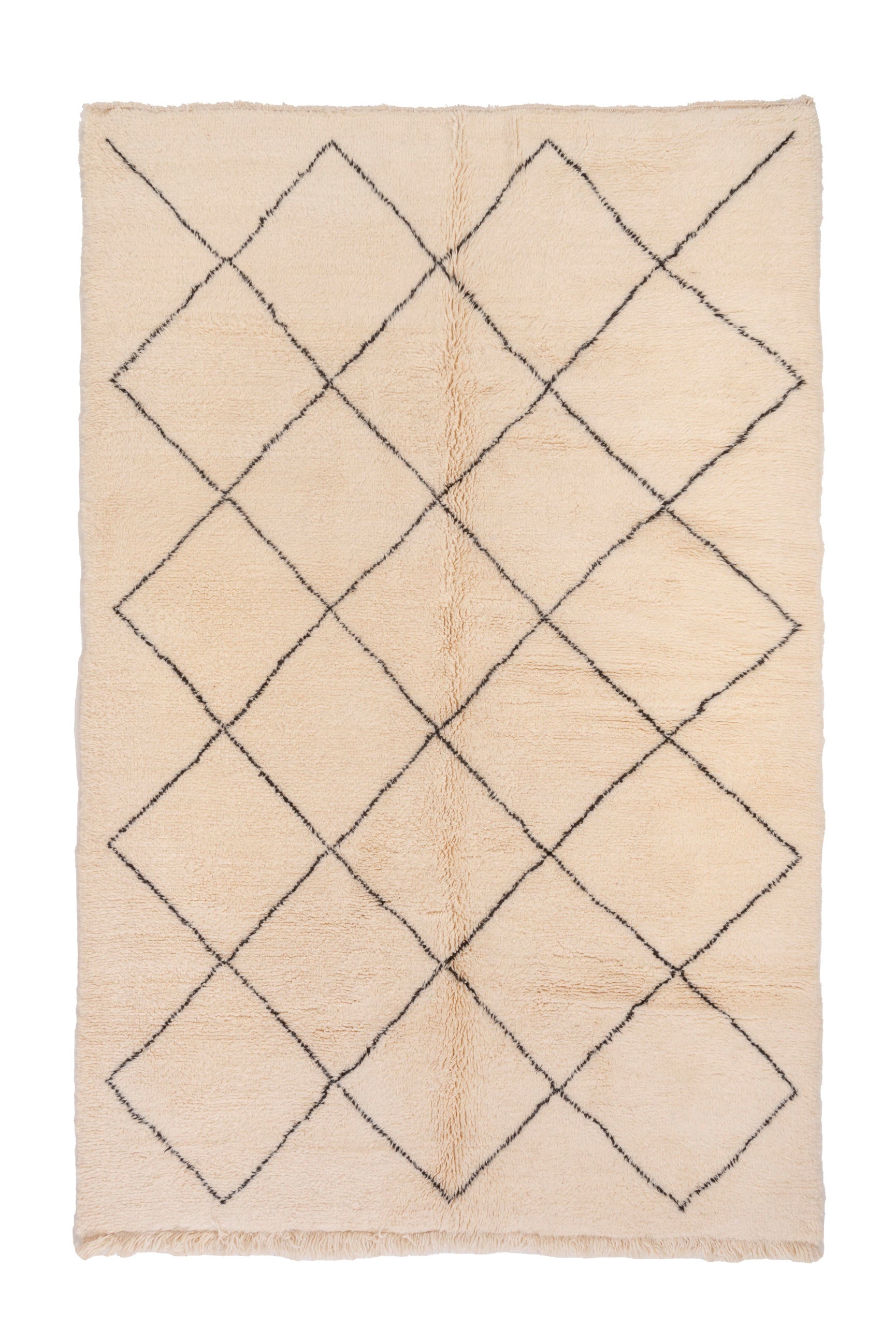 Elevate your space with our Ivory Classic Crisscross Beni Ourain Rug. This timeless piece features a traditional Moroccan crisscross design in ivory and black, adding warmth and sophistication to your decor.