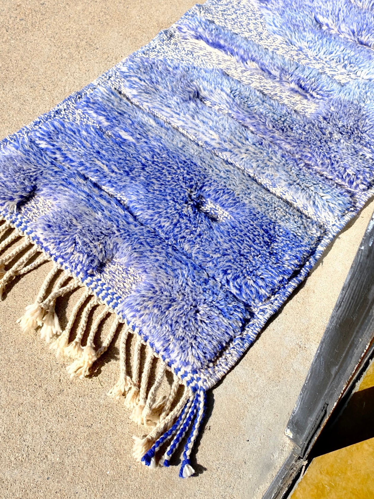 Elevate your space with our captivating "Serene Horizon Future Rug." Expertly handwoven with a striking blend of white and blue yarn, this rug features bold "Future" letters that infuse modern energy into classic design. Immerse your home in the tranquility of serene colors while embracing a forward-looking perspective. Discover the perfect fusion of aesthetics and aspiration with this exquisite addition to your décor.