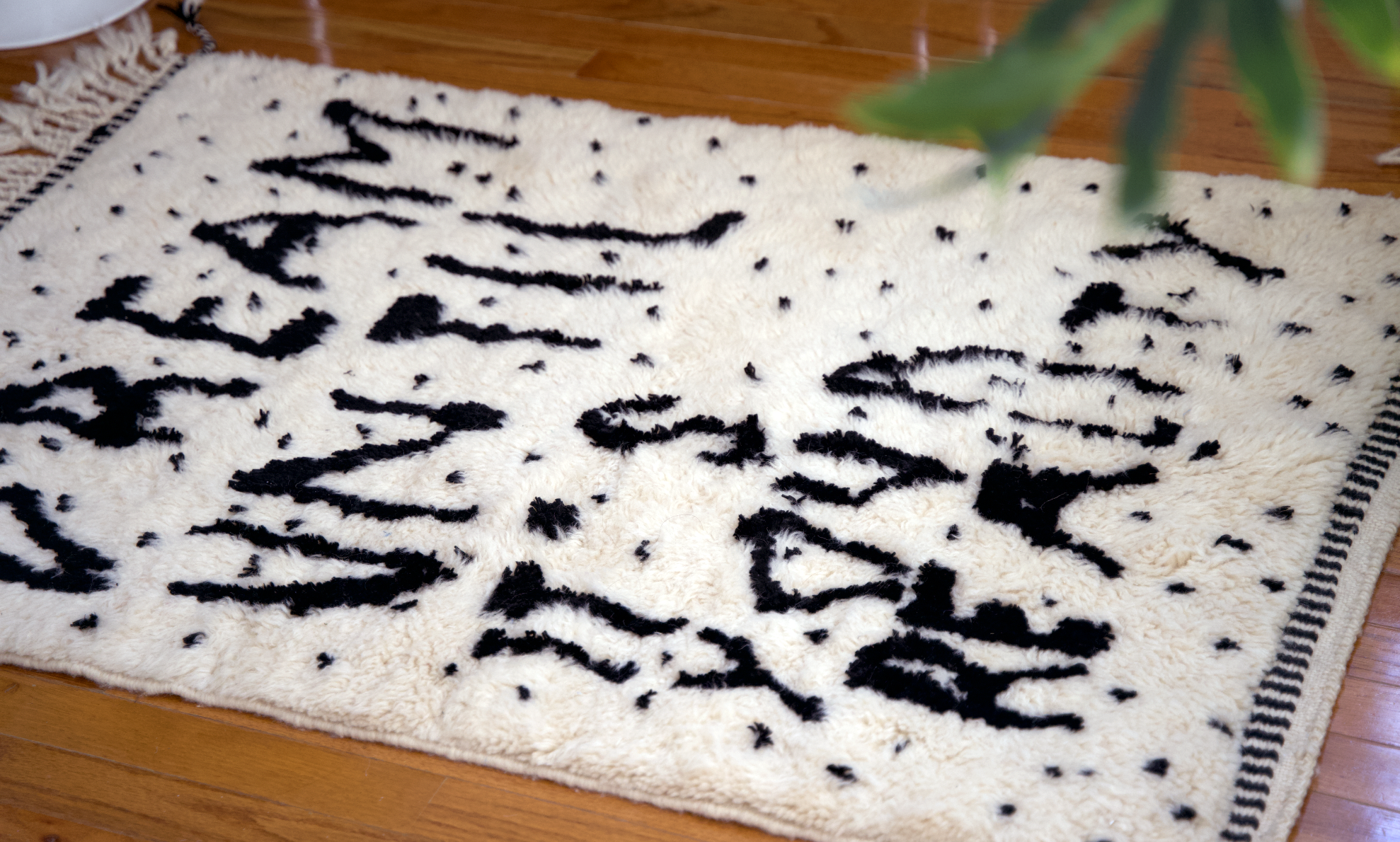 Experience the captivating allure of our Ivory Dreamscape Berber Rug, where the timeless charm of classic English script weaves a mantra of inspiration: "Dream Until It Is Your Reality." Immerse your space in this exquisite blend of classic design and motivational sentiment, transforming your home with an air of elegance and aspiration.